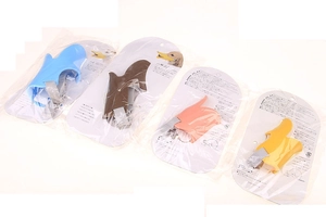 Detail of colorful duck-billed silicone dog muzzles in various sizes and colors