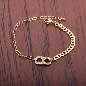 Gold Cuban and paperclip chain link bracelet with sparkling pave pig nose center piece