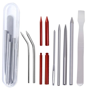 Paracord FID set with needles and flattening tool in a transparent plastic storage box