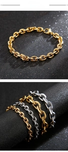 Detail of polished stainless steel O-chain bracelets in gold and silver finish