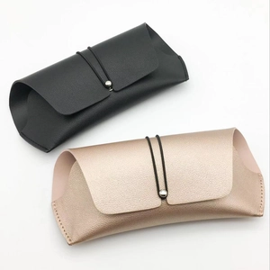 Chic black and gold PU leather glasses pouch with drawstring closure and fine stitching