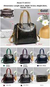 Detail showing dimensions and intricate floral embossed texture of the tote handbag