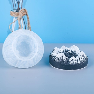 Detail showing snow mountain silicone mold for resin with finished mountain sculpture