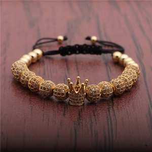 Adjustable woven bracelet with gold crown and micro-pave zircon beads on black cord
