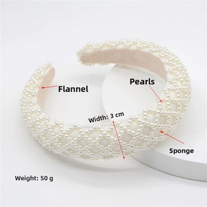 Close-up of padded headband with white pearls and 3cm width dimension details