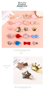 Close-up of glitter heart and crown hair clips with detailed metal snap fasteners