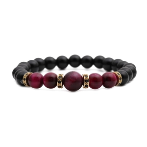 Beaded bracelet featuring red tiger eye stones, matte black beads, and gold spacers