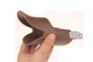 Detail of coffee brown duck bill dog muzzle with adjustable silicone strap design