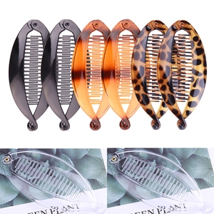 8-piece set of banana hair clips in black, amber, and leopard print on a white background