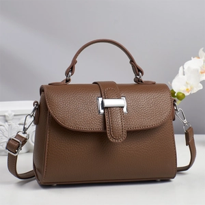 Elegant dark brown lychee leather handbag with silver buckle and detachable shoulder strap