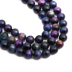 Polished starry tiger eye stone beaded bracelet with natural blue and purple mineral texture