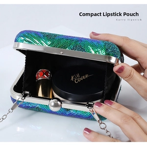 Detail shot of mini sequin evening bag showing interior space for lipstick and makeup