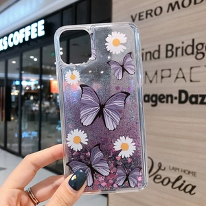 Close-up of liquid glitter phone case with purple butterflies and daisies for iPhone