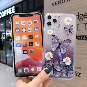 Detail of iPhone case with purple butterfly and daisy patterns in flowing glitter liquid