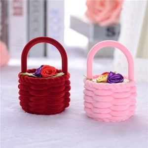Velvet basket jewelry boxes in red and pink with flower accents in a dual product view