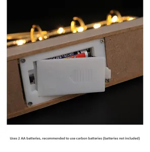 Detail view of the wooden calendar battery compartment for two AA carbon batteries