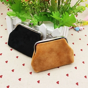 Plush coin purse with metal kiss lock closure in black and camel color faux fur