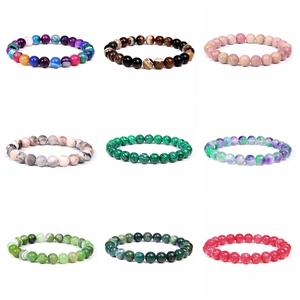 Collection of 8mm natural stone elastic bracelets in various colors and textures