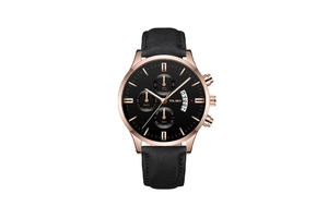 Detail of rose gold watch case with three-eye chronograph dial and black leather strap