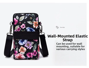 Detail view of floral crossbody phone pouch with elastic band and silver metal hook