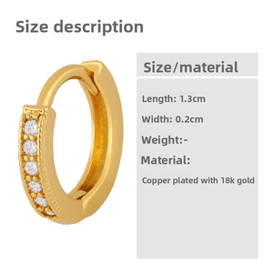 Detail view of 1.3cm 18K gold plated copper hoop earring with five inset zircon stones