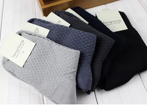 Detail of five-color bamboo fiber crew socks featuring micro-grid knit and ribbed cuffs