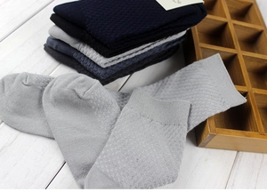 Detail of bamboo fiber crew socks featuring a solid waffle texture and breathable knit