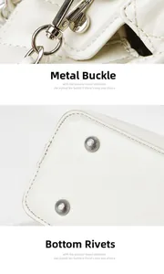Détails du sac cabas en cuir blanc montrant le fermoir argenté et les rivets de fond