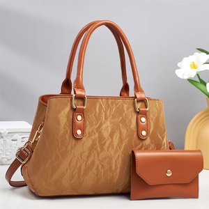 Brown pleated soft leather handbag and matching envelope bag set with gold hardware