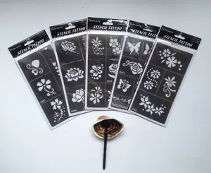 Pochoirs de tatouage semi-permanents avec motifs de fleurs et de papillons et pinceau