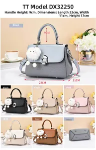 Detailed view of women's handbag dimensions showing 22x11x17cm size and pompom charm