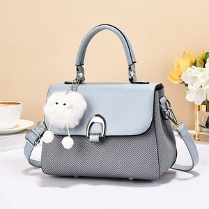 Blue and gray woven crossbody handbag for women with fluffy charm and silver clasp