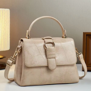 Chic beige crocodile pattern handbag for women with gold metal clasp and top handle