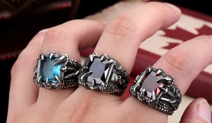 Gothic dragon claw rings with cubic zirconia in blue, black, and red set in stainless steel