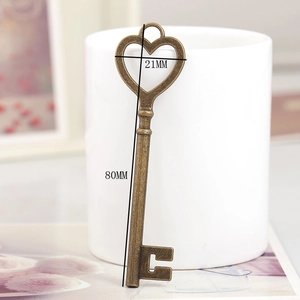 Detailed view of bronze heart-shaped key pendant with 80mm length and 21mm width measurements