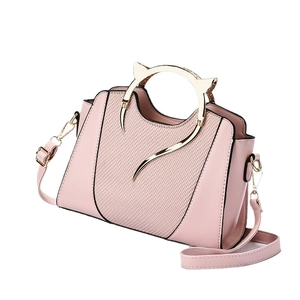 Pink PU leather tote with golden cat ear handles and woven texture crossbody strap