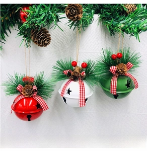 Set of red, white, and green Christmas bells with pine cones, berries, and bows