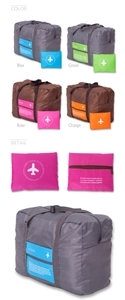 Detail of 32L foldable travel bags showing compact storage and trolley sleeve attachment