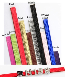 Detail view of colorful 30mm leather bracelets with sparkling rhinestone letter charms