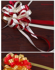 Detail of large double-layered satin ribbon pull bows for wedding and gift decoration