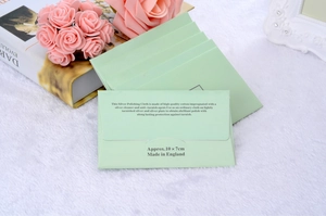 Detailed view of silver polishing cloth packaging in light green, size approx 10x7cm