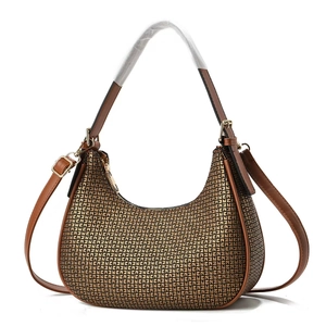 Retro monogram Hobo handbag with brown leather trim and adjustable crossbody strap