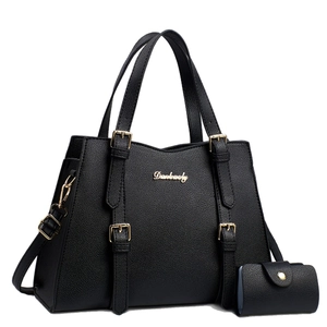 Classic black pebbled leather Boston bag set with gold hardware and matching wallet
