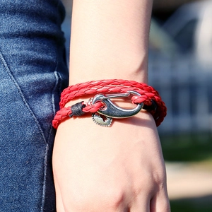 Red braided leather multi-layer wrap bracelet with silver heart charm on model wrist