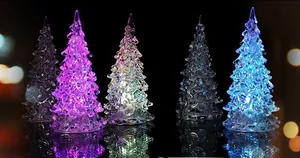 Detail view of crystal-textured LED Christmas trees glowing in multiple colors