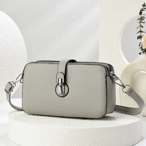 Gray textured leather small square shoulder bag with double zippers and silver hardware