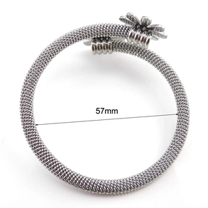 Two-tone 18K gold plated sunflower titanium steel woven bracelet with 57mm inner diameter