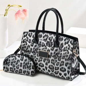 Stylish leopard print shell tote bag and crossbody pouch set with golden hardware