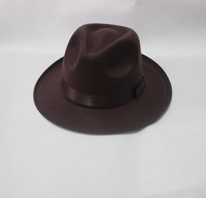 Detailed view of deep brown wool felt jazz fedora with matching silk ribbon band