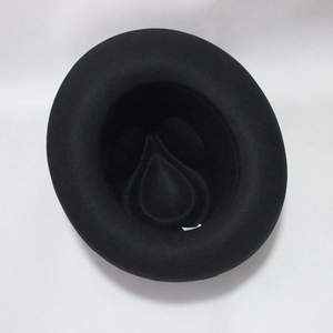 Top view of a black wide-brim wool jazz fedora hat with a classic C-crown design